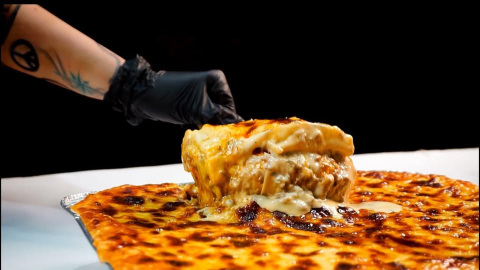 116 Kitchen signature lasagna — golden, cheesy, and freshly baked